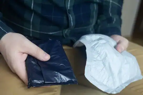 image of man holding stool incontinence Coventry  products